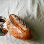 bread-and-wine-on-white-tablecloth