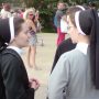 young-nuns-talking-in-a-crowd