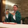 priest-holding-eucharist