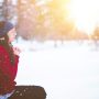 woman-praying-in-snow